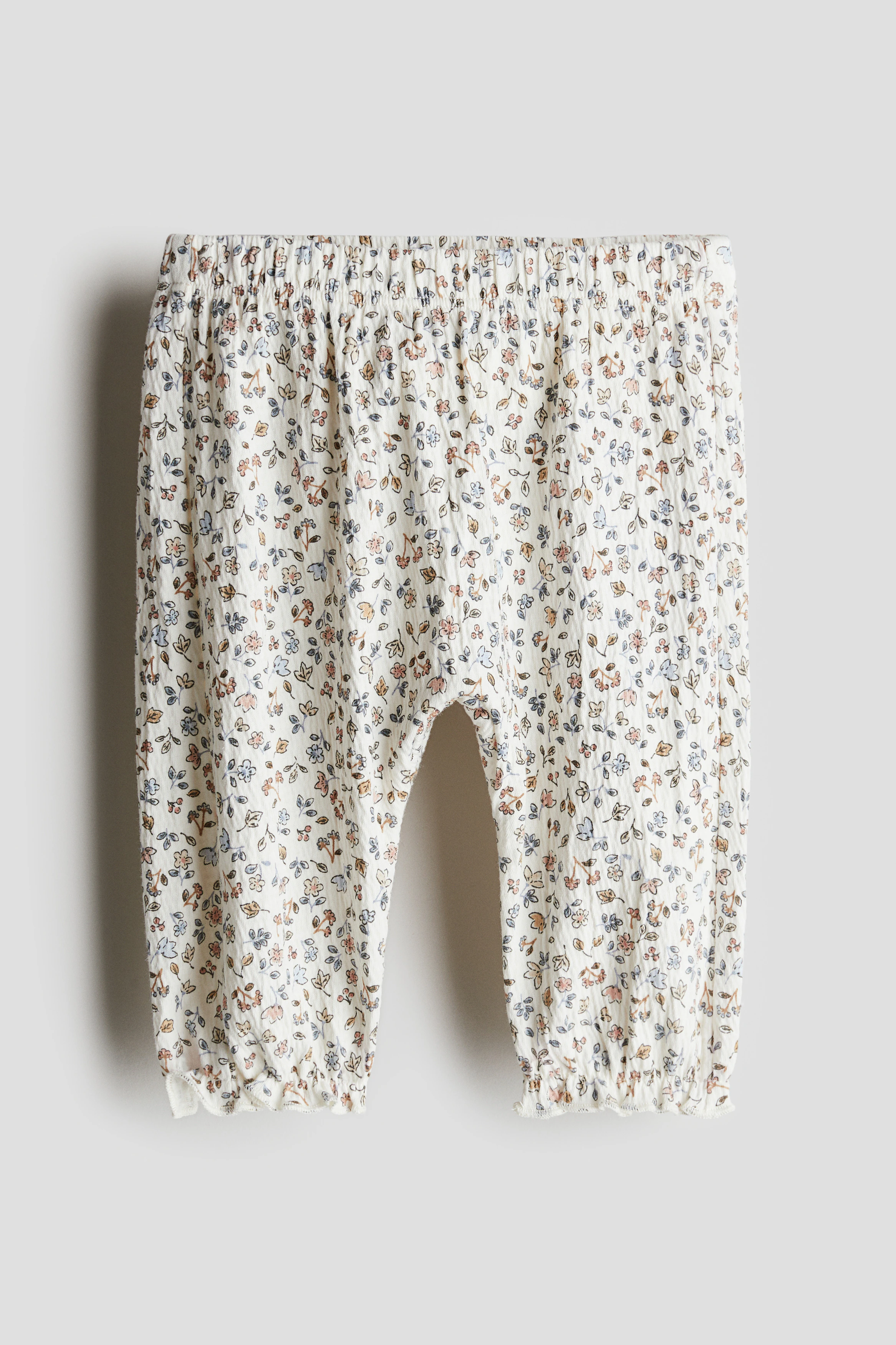 Crinkled jersey trousers — White/Floral