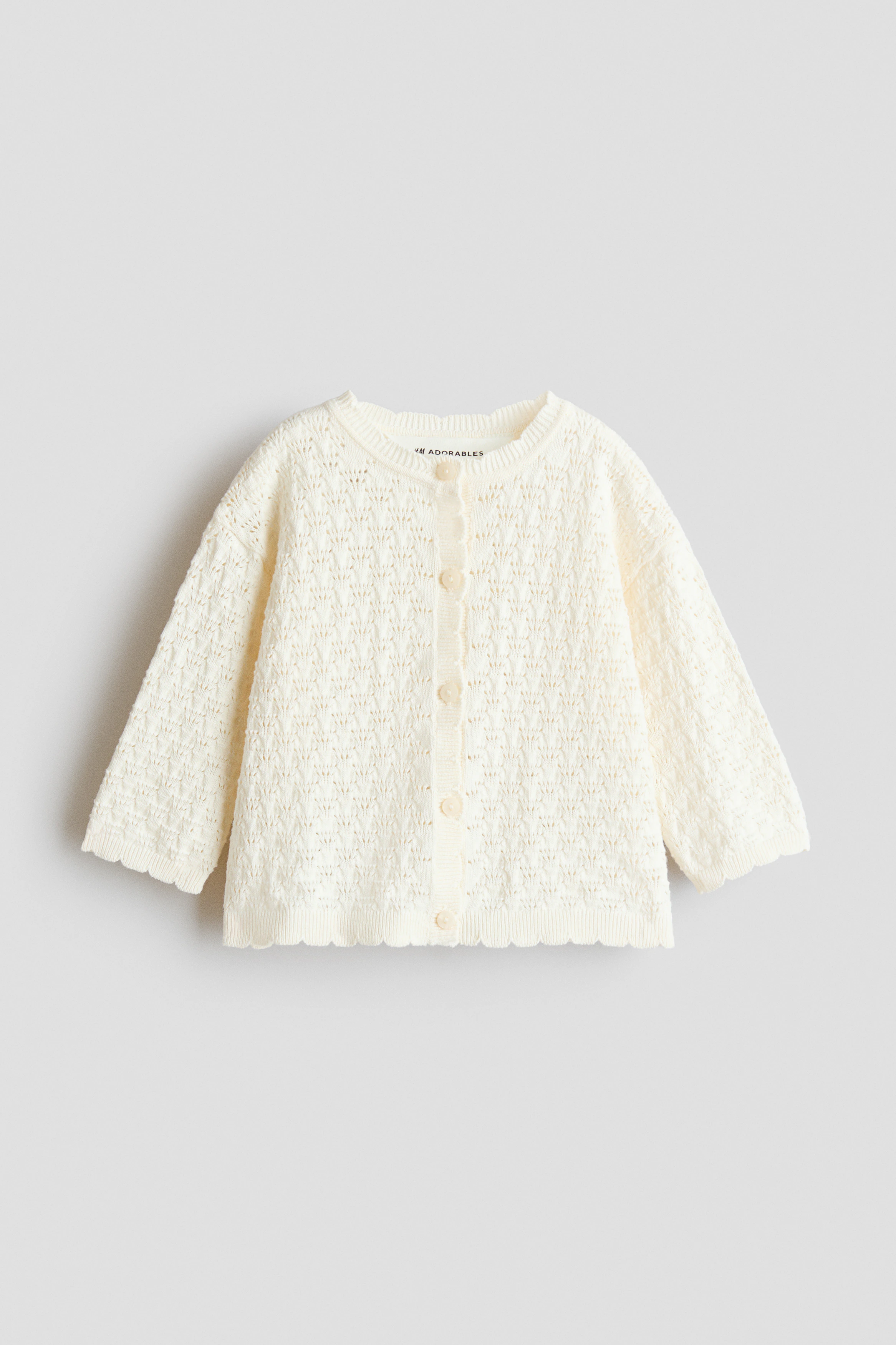 Pointelle-knit cotton cardigan — Cream